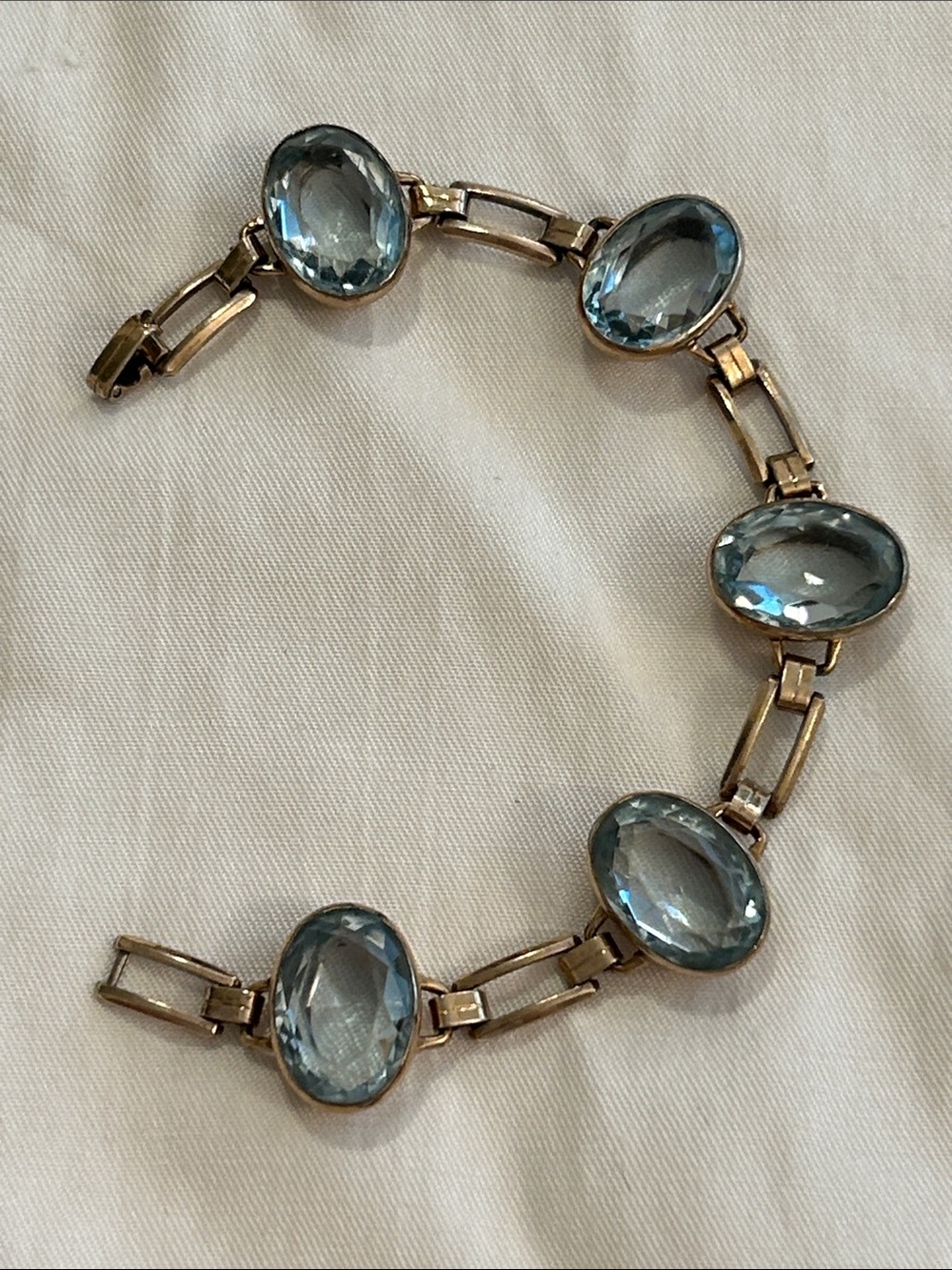 Gold Bracelet with Blue Oval Stones